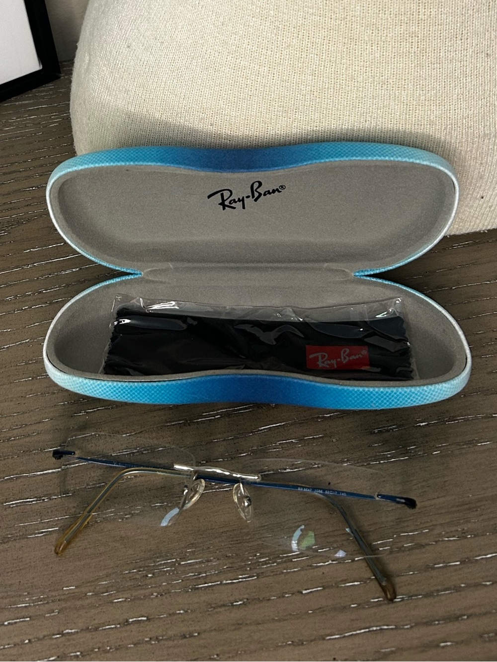 Ray-Ban Rimless Eyeglasses with Light Blue Case and unused cloth lens cleaner